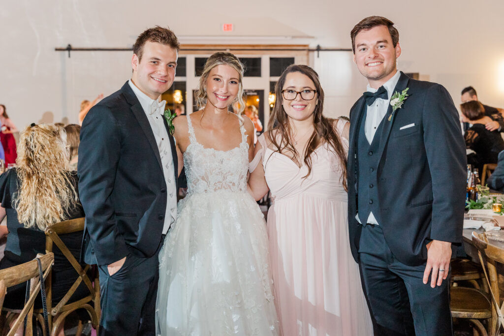 bride and groom with guests