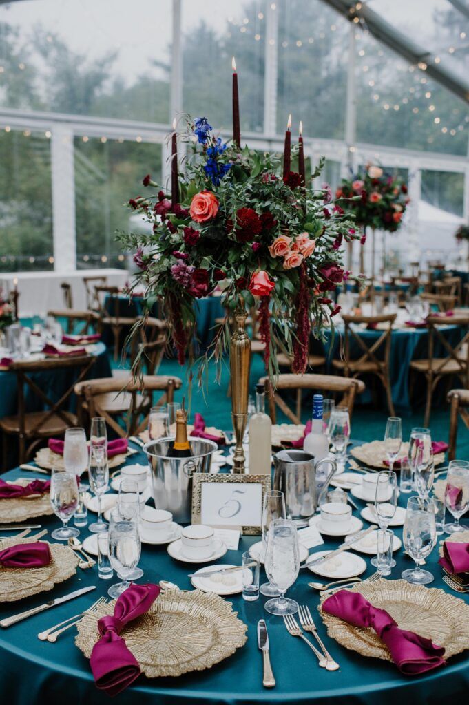 Table settings and with tall centerpeice.
