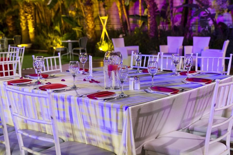 Square table set with chairs for a wedding