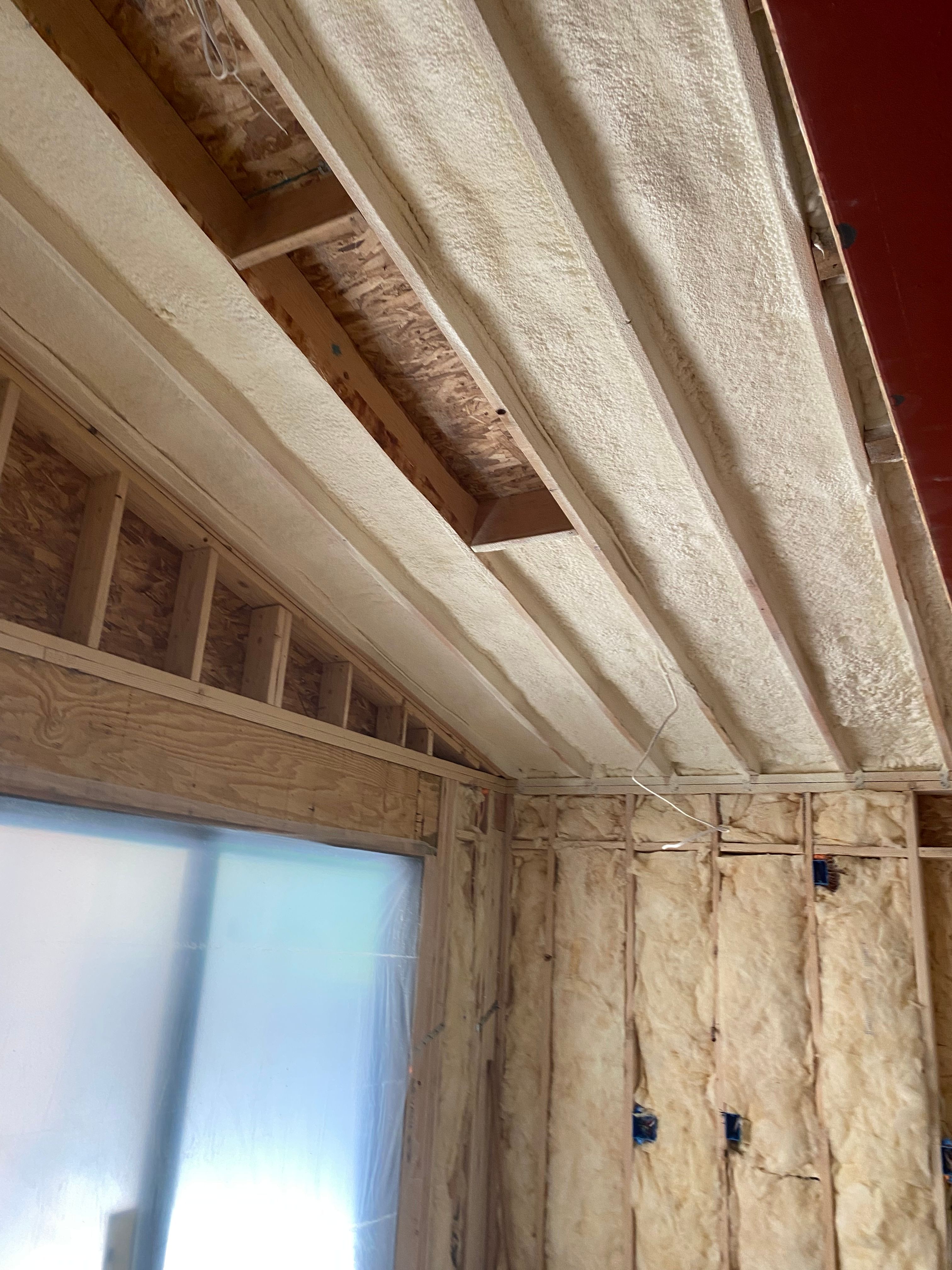 Batt insulation project photo showing clean coverage and careful cuts