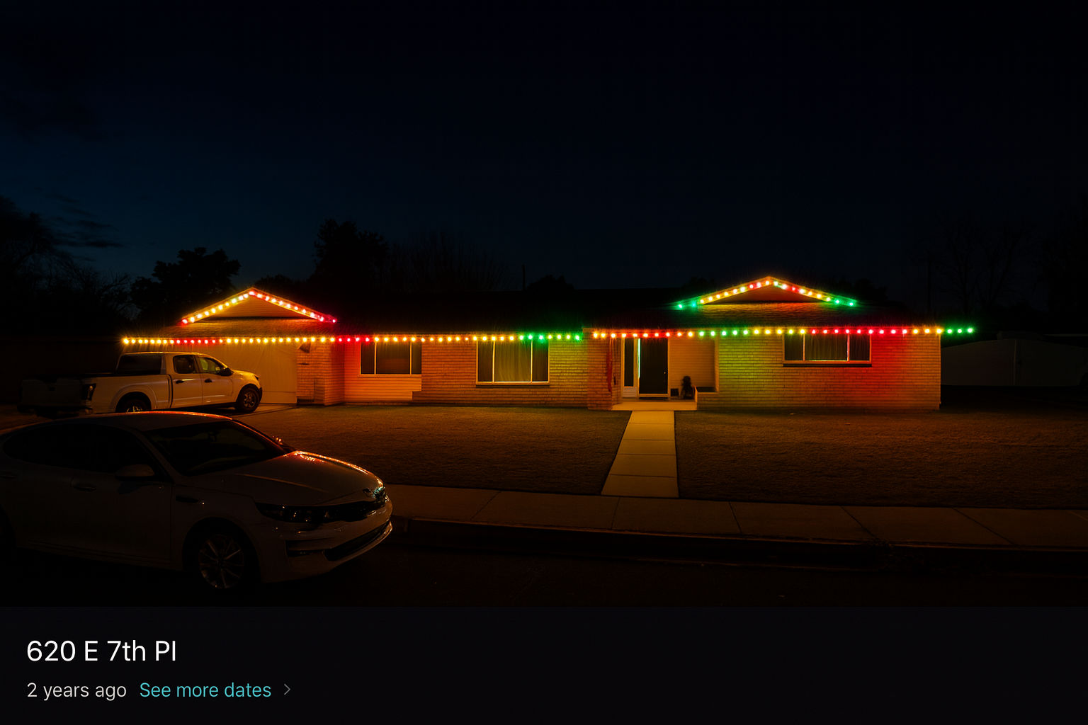 Professional permanent holiday light installation showcasing color-changing LED technology