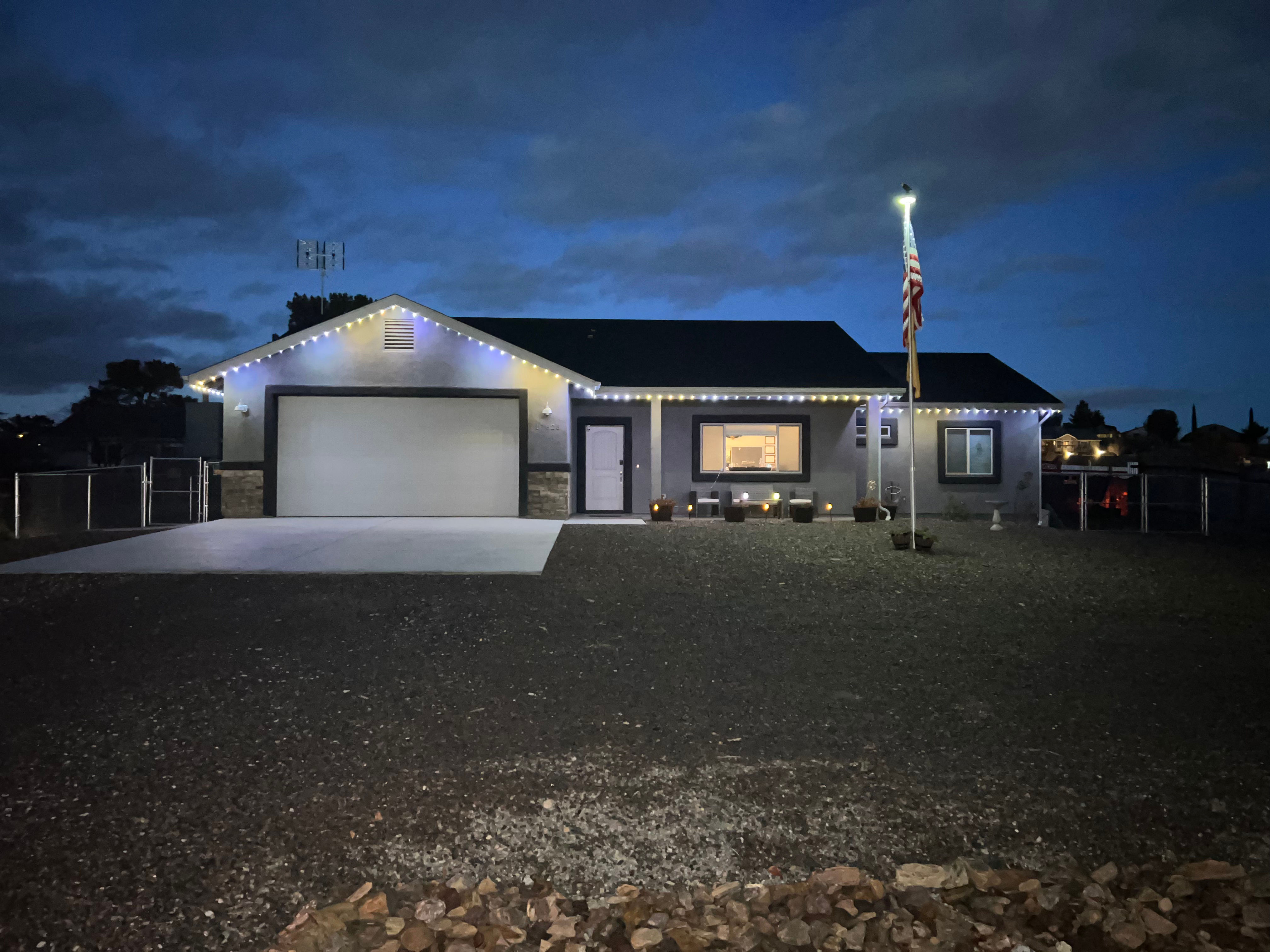 Glow Daddy permanent LED lights installation on Phoenix Valley home showing vibrant Christmas colors