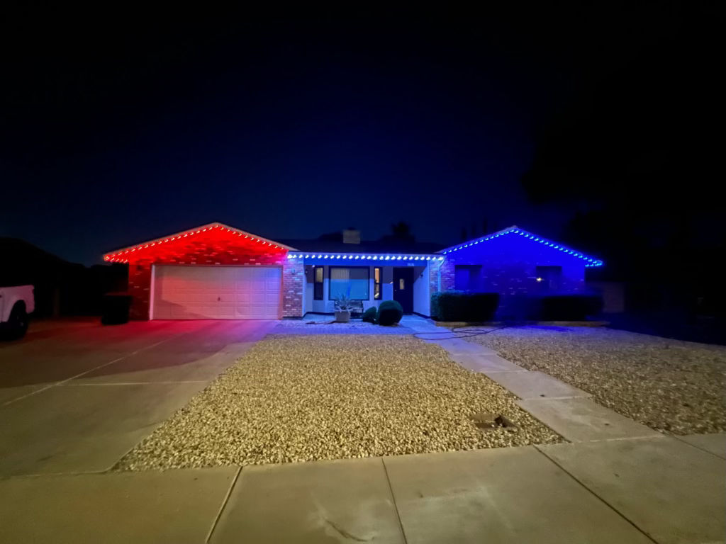 Smart-controlled permanent holiday lights on Arizona residential home