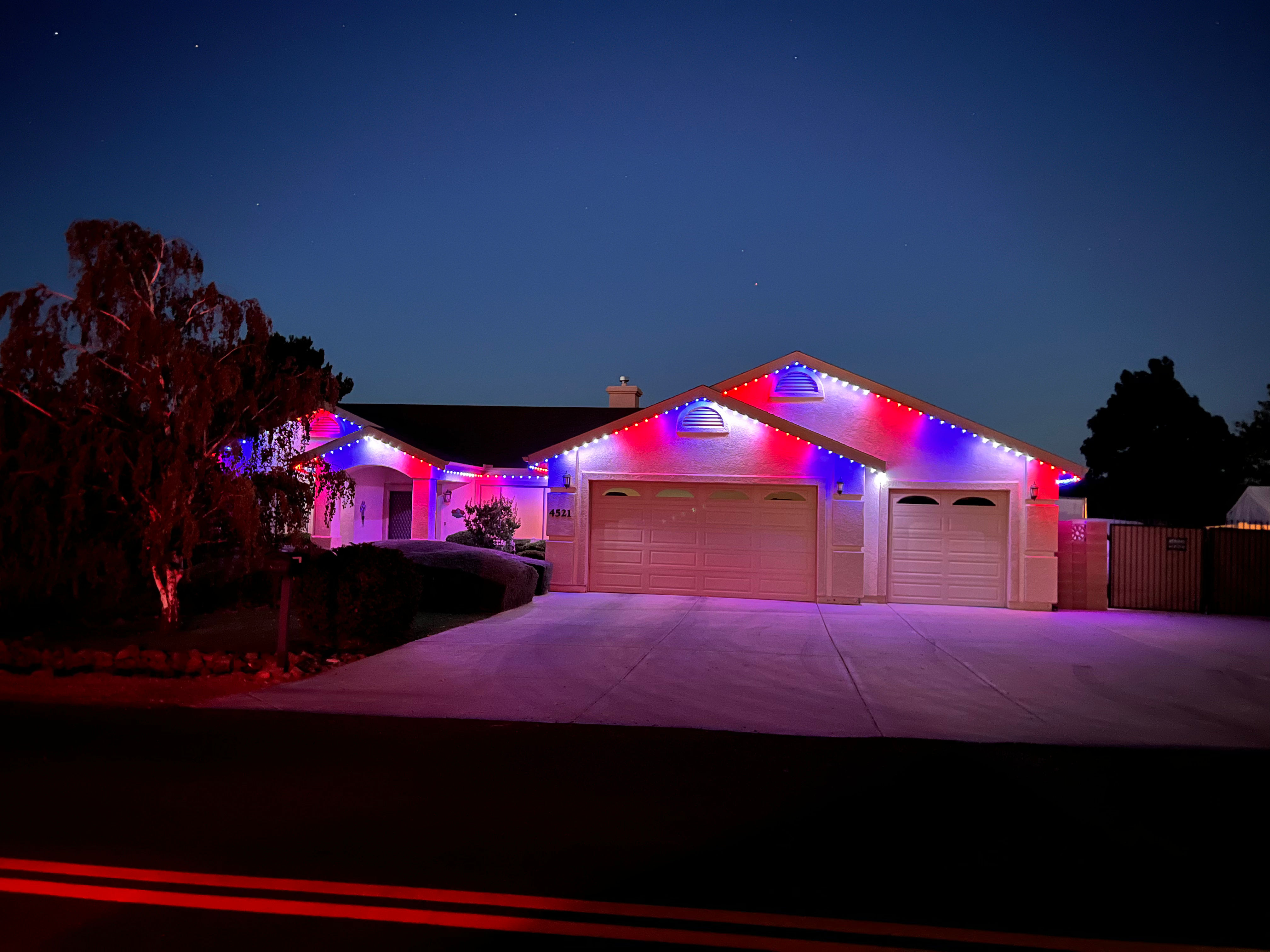 Custom permanent holiday lighting design on Phoenix Valley residential property
