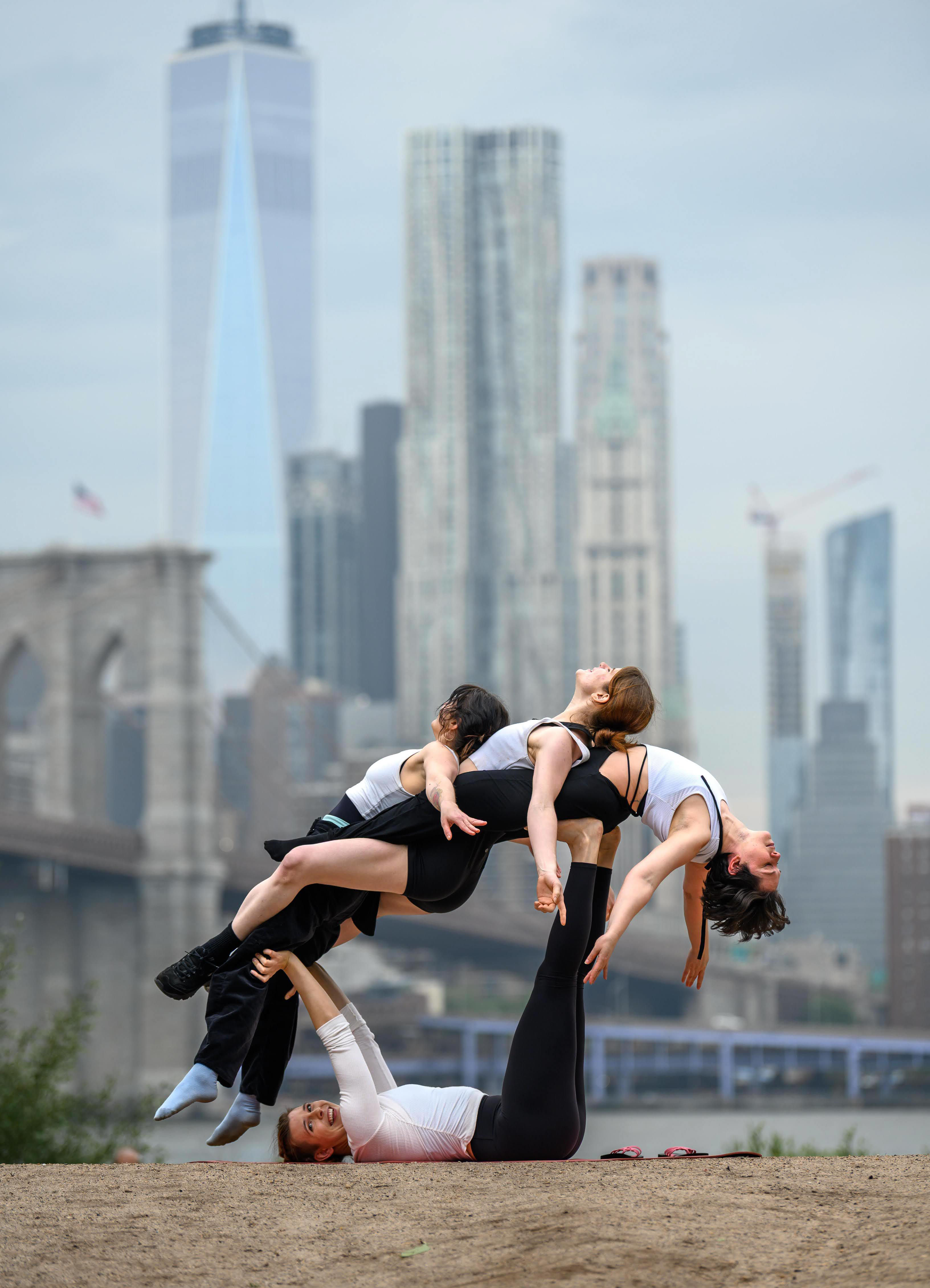 Acro Yoga Pose: Three Person Whale