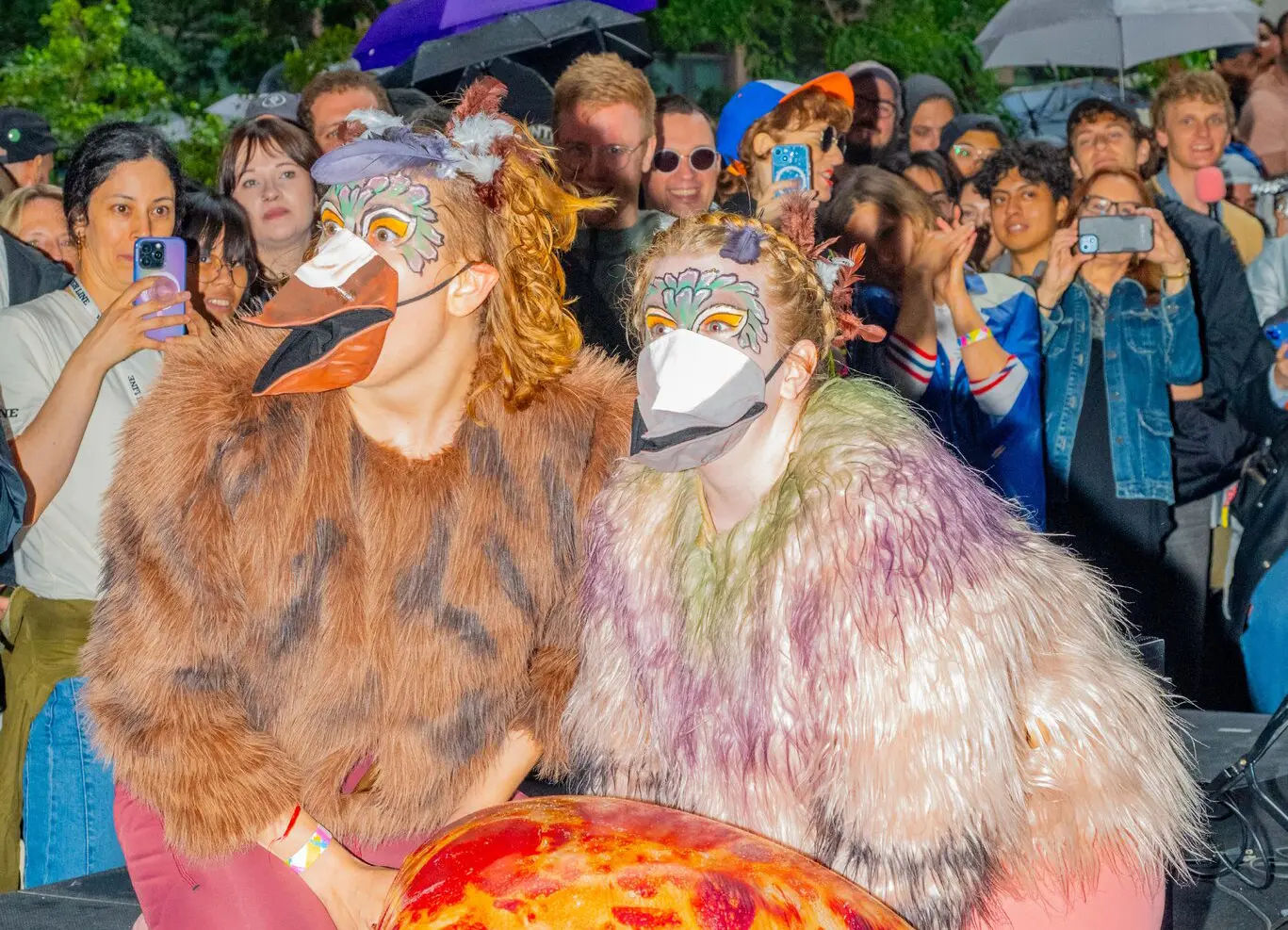 Two women dressed as pigeons