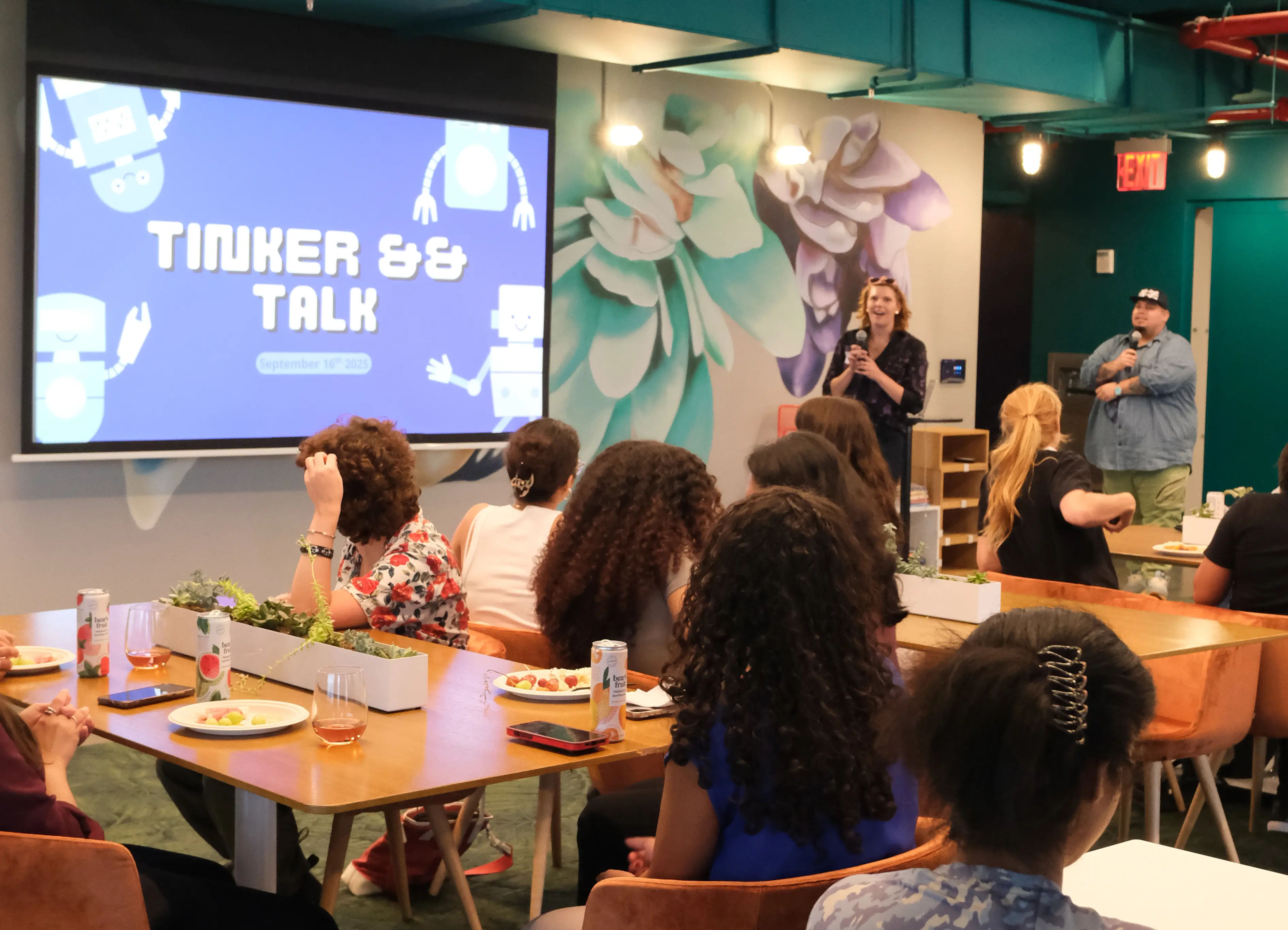 Mandy speaking to a crowd of people