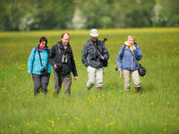 Een deel van de groep struint door de graslanden. © David 'Billy' Herman