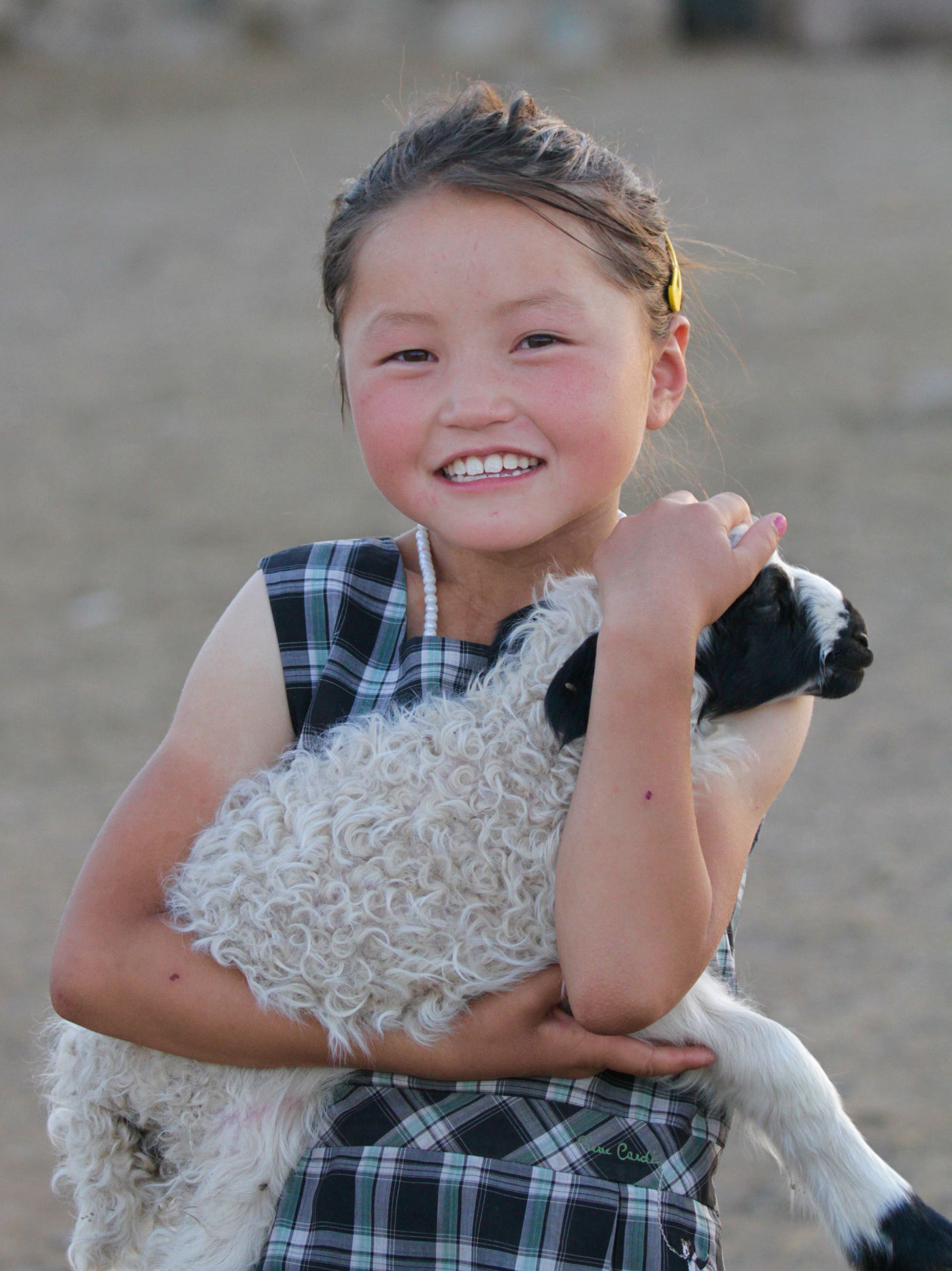 A shepherd's daughter with lam. © Geert Beckers