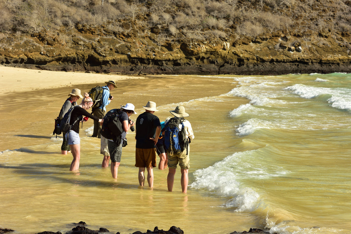 The group in the surf on one of the islands. © Yves Adams