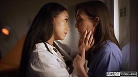 Latin milf doctor Vicky Chase seduce nurse Sinn Sage to comply to stay o