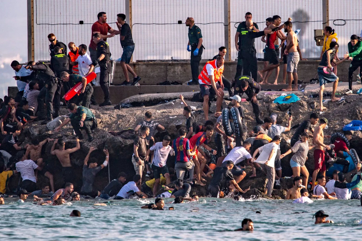 At Least 18 Migrants Die as Thousands Cross Into Spain’s Ceuta