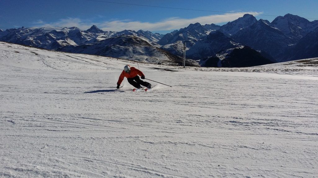 A person skiing on a snowy mountain