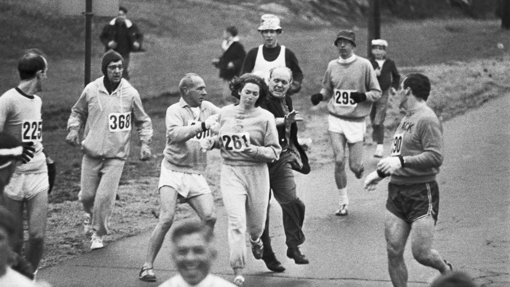 Kathy Switzerm running a marathon.