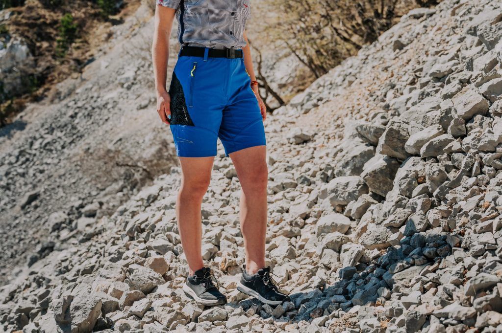 A girl wearing Nima Bermuda short hiking pants.