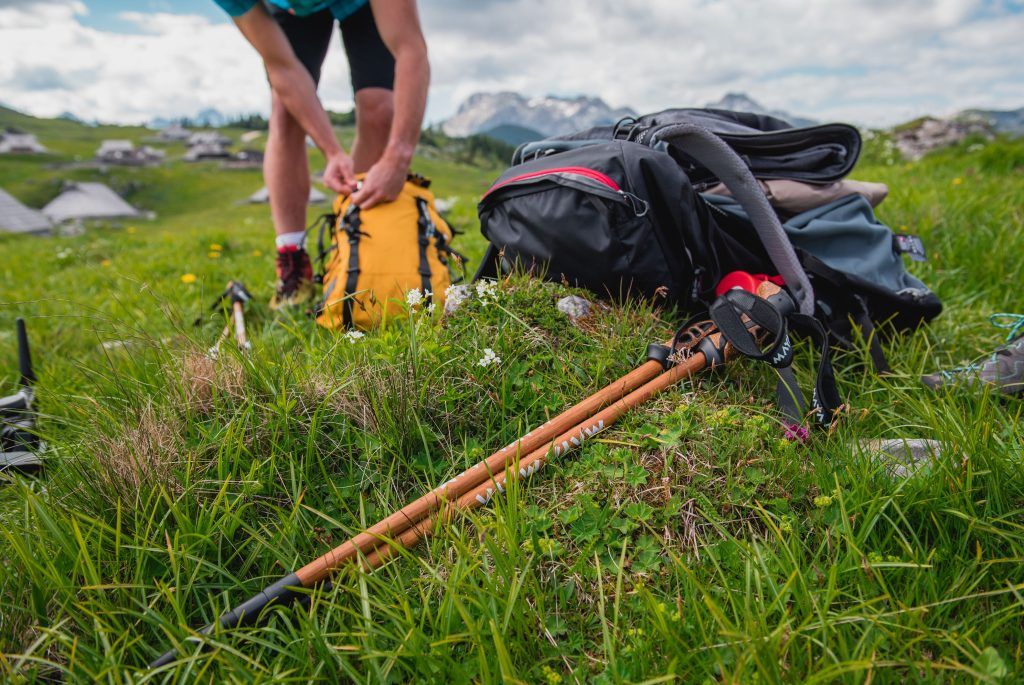 Trekking equipment and gear on top of a mountain