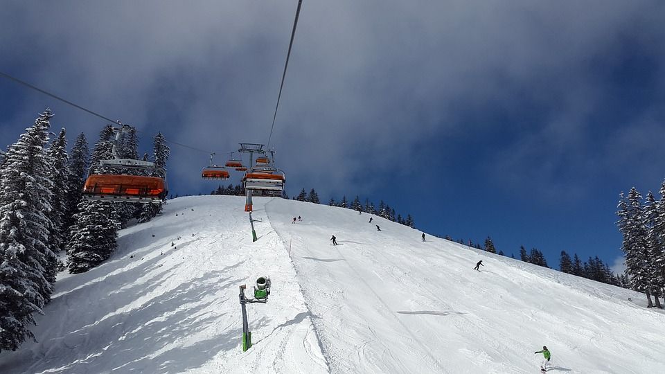 Chair lift by the ski slope.