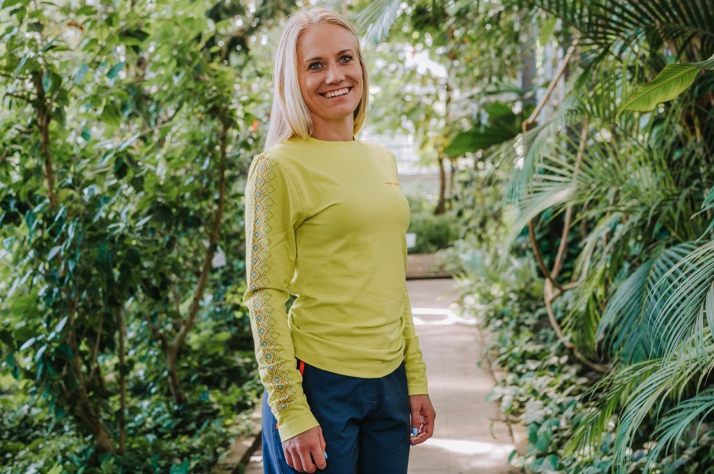 Women wearing yellow long sleeve shirt made from organic cotton from MAYA MAYA