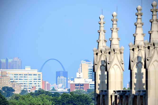 A view of the St. Louis skyline over Brown Hall. (Photo: James Byard/Washington University)