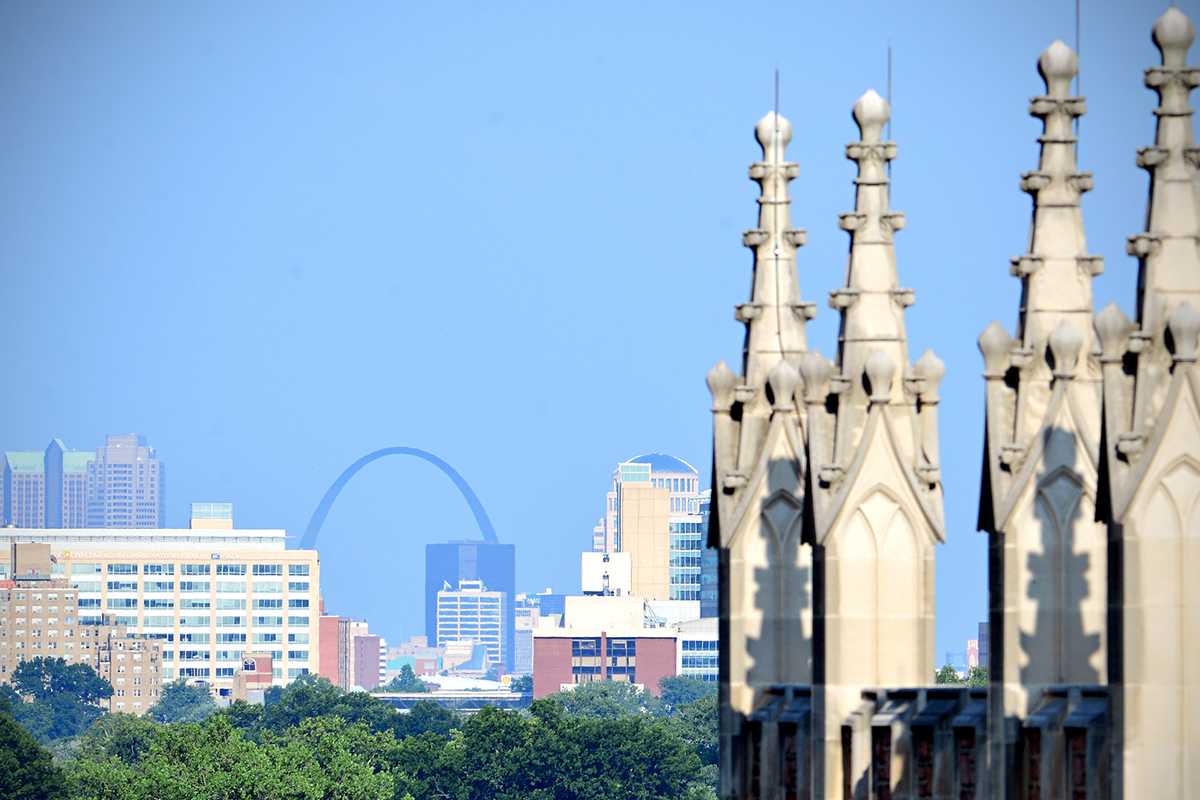 A view of the St. Louis skyline over Brown Hall. (Photo: James Byard/Washington University)