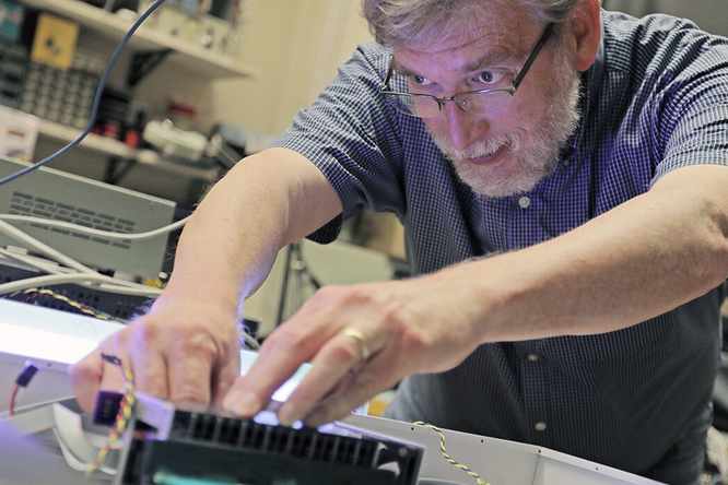 James H. Buckley, professor of physics in Arts & Sciences, received a $4.9 million award from NASA to build a demonstration version of a large satellite experiment for gamma-ray astronomy research. (Photo: Tom Malkowicz)