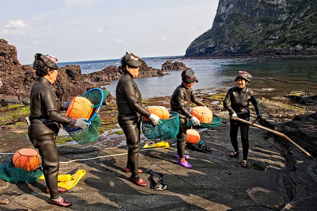 Women in Jeju, South Korea, known as Haenyeo, make a living diving in icy cold water for seafood and seaweed. Tae Seok Moon plans to study whether bacteria plays a role in the tolerance of cold water by these divers and by those in the U.S. military. (Photo credit: iStock photo)