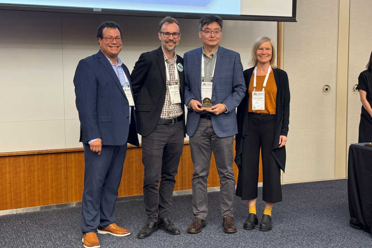 (From left): AEESP Vice President Jose Cerrato of the University of New Mexico; AEESP President Lee Blaney of the University of Maryland, Baltimore County; Frederick George Pohland Medal recipient Zhen (Jason) He of Washington University in St. Louis and AEESP President-elect Kara Nelson of the University of California, Berkeley. (Credit: Zhen (Jason) He)