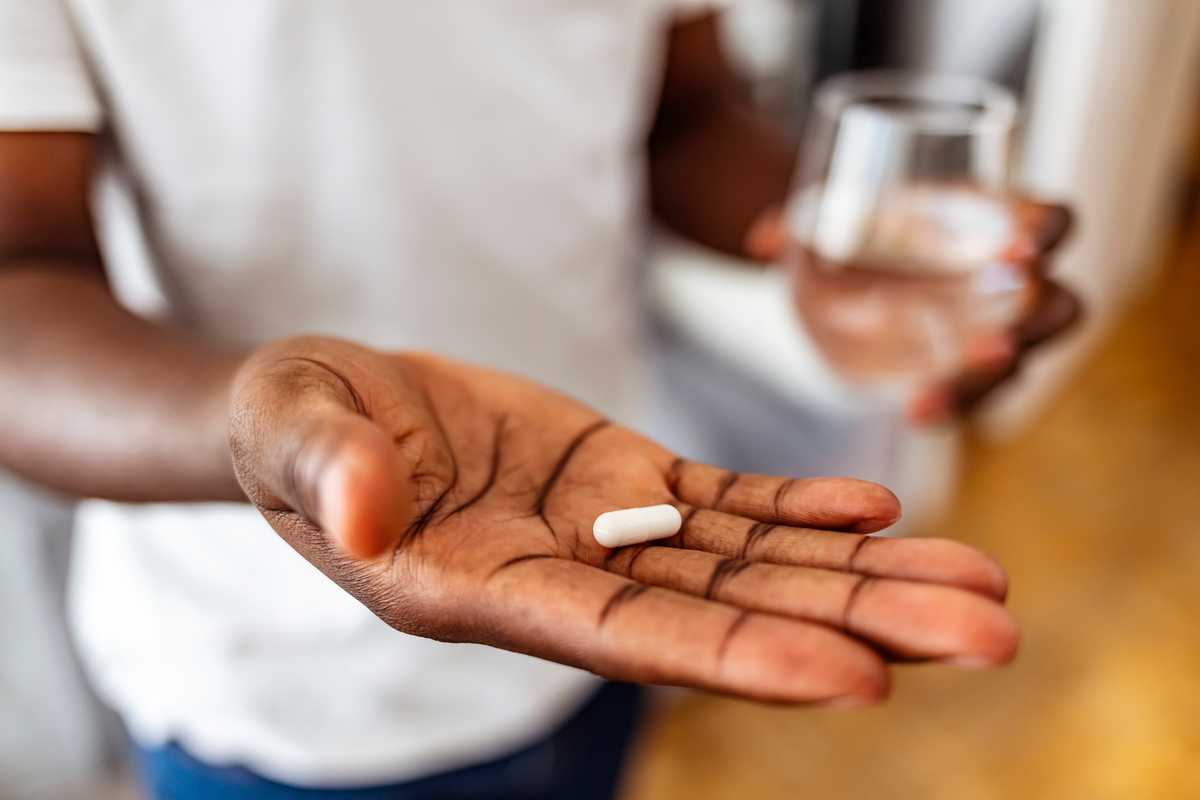 Graduate student Claire Najjuuko set out to develop a machine learning model to predict which adolescents with HIV would be less likely to adhere to antiretroviral therapy. With such knowledge, health care practitioners could implement interventions for those identified as less likely to adhere to the treatment plan. (Credit: iStock photo)