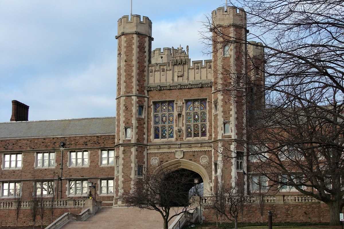 Is this Brookings Hall, or an altered photo? This real photo of Brookings Hall has been altered to include stained glass windows above the archway. A team of computer scientists in Nathan Jacobs’ lab has developed a model that learns to detect fake images by learning which are real.  (Credit: Jacobs lab using Nano Banana 2 model in Google Flow)