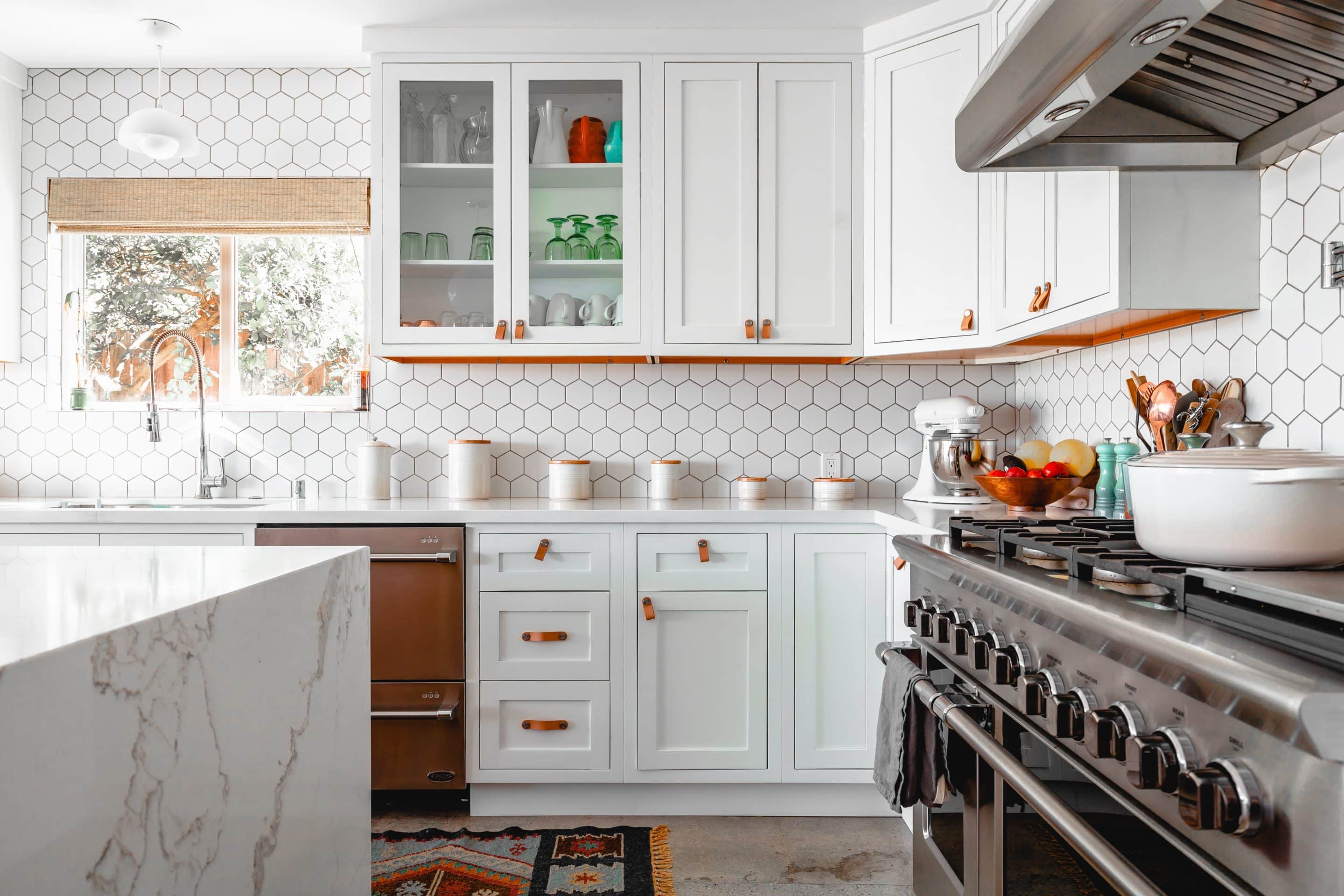 White kitchen with wood accents Kitchen remodeling contractor