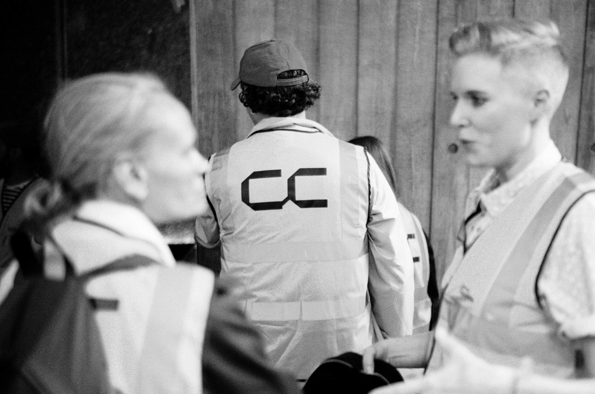 A group of people wearing hi-vis with Concrete Communities logo printed on the back at the Southbank Centre, London.