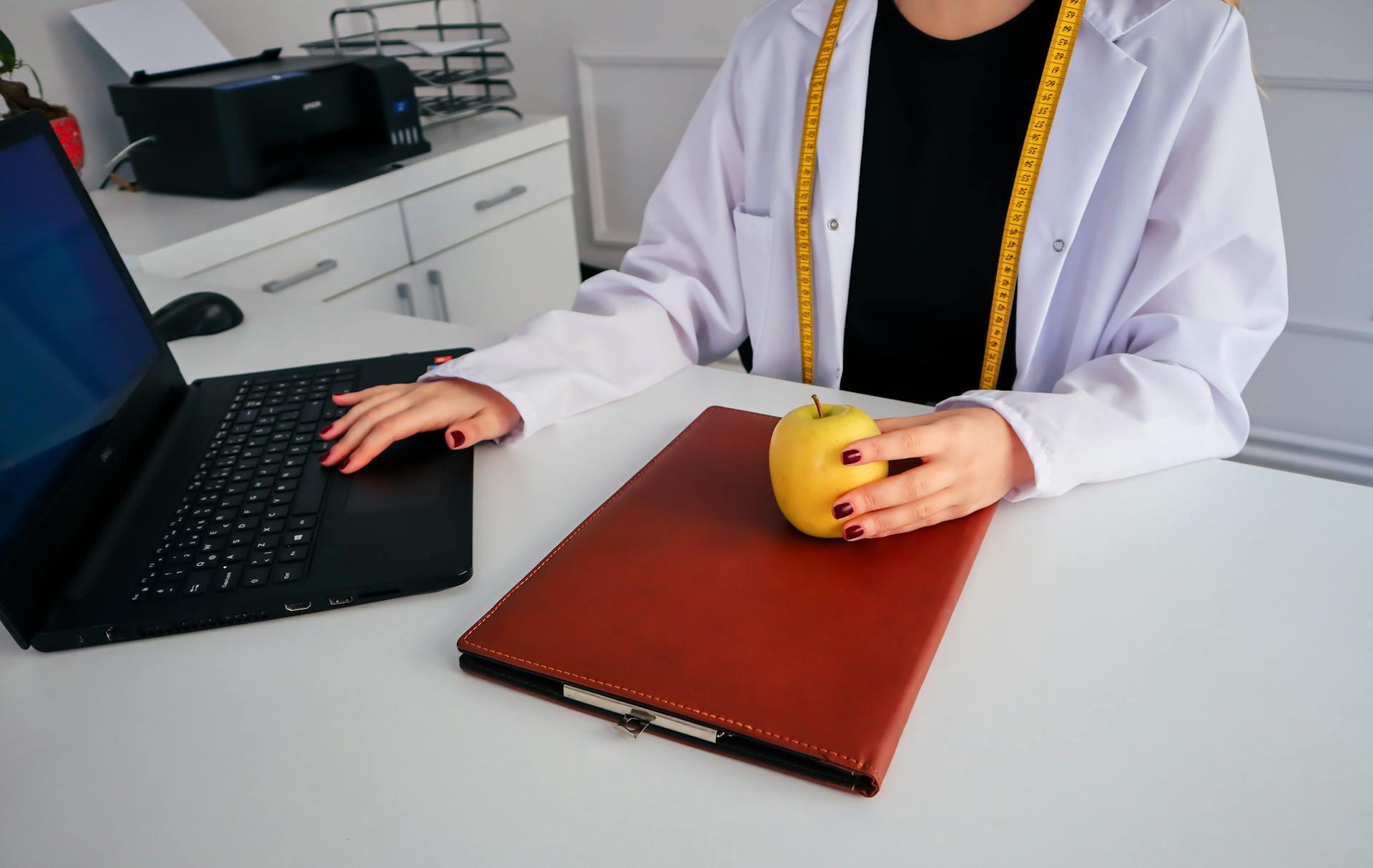 Dietician with an apple