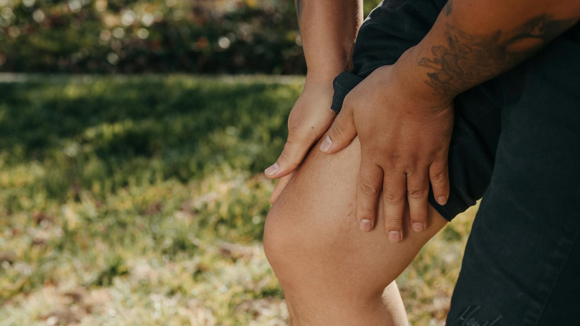 Physiotherapist helping a patient with exercises