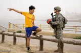 Kid Arguing With Soldier