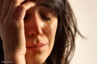 Crying Woman Hand On Face