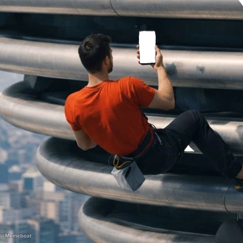 Alex Honnold Checking His Phone - meme generator image preview