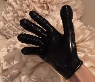 Black Latex Glove from Recent Jeffrey Epstein Photo Leaks