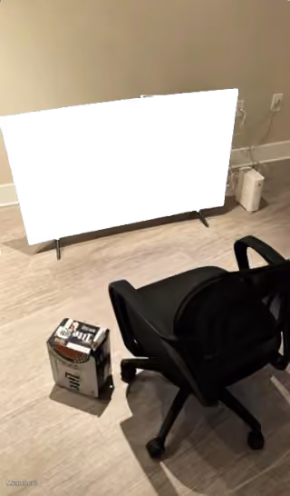 Blank Screen TV on Floor with Beer Case