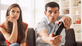 Bored woman boyfriend playing video game