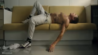 Brad Pitt Resting on a Sofa F1