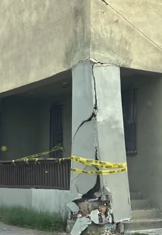 Caution Tape Fix on Building Pillar