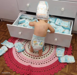 Baby Raiding Diaper Drawer