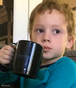 Confused Kid Holding Mug