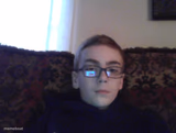 Deadpan Kid on Couch