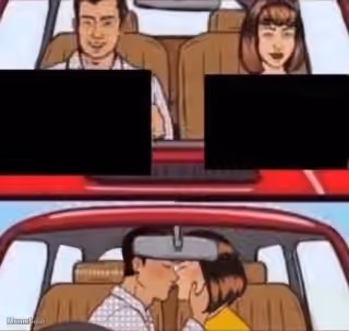 Couple in a Red Car