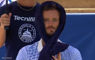 Daniil Medvedev Towel over Head Stare