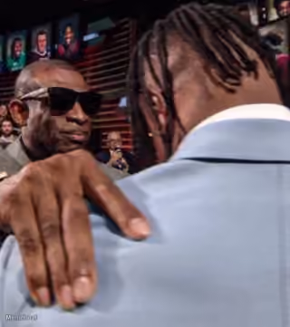 Deion Sanders Hand on Shoulder