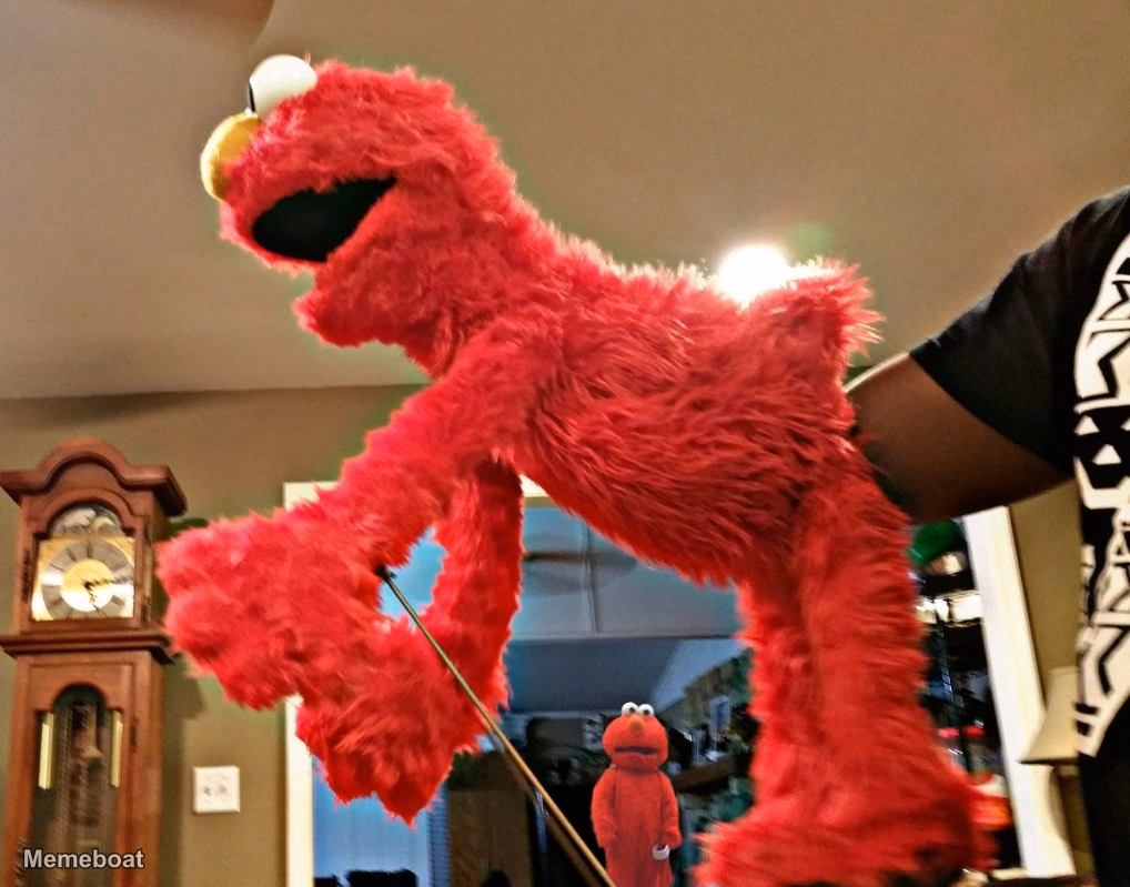 Elmo Getting Fisted While Another Elmo Watches in Horror - meme generator image preview