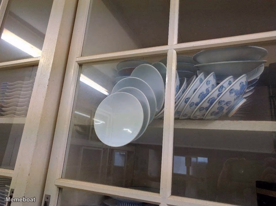 Falling Plates in Closed Cupboard - meme generator image preview