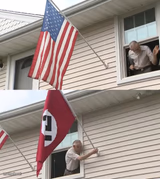Man Switching Flags